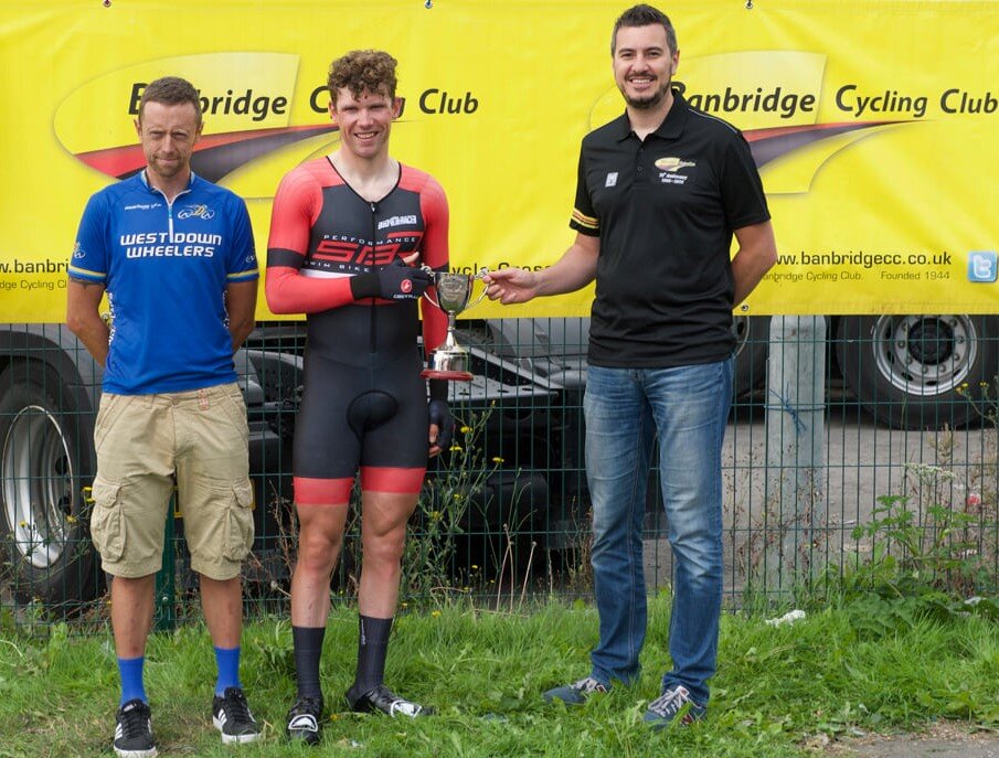 2021 winner of the Thomas White Memorial, Marcus Christie, is presented the Thomas White Memorial cup by Event Organiser Aaron Wallace.  Also pictured is Paul Wilkinson, nephew of the late Thomas White. Photo by  Paul Hannigan.